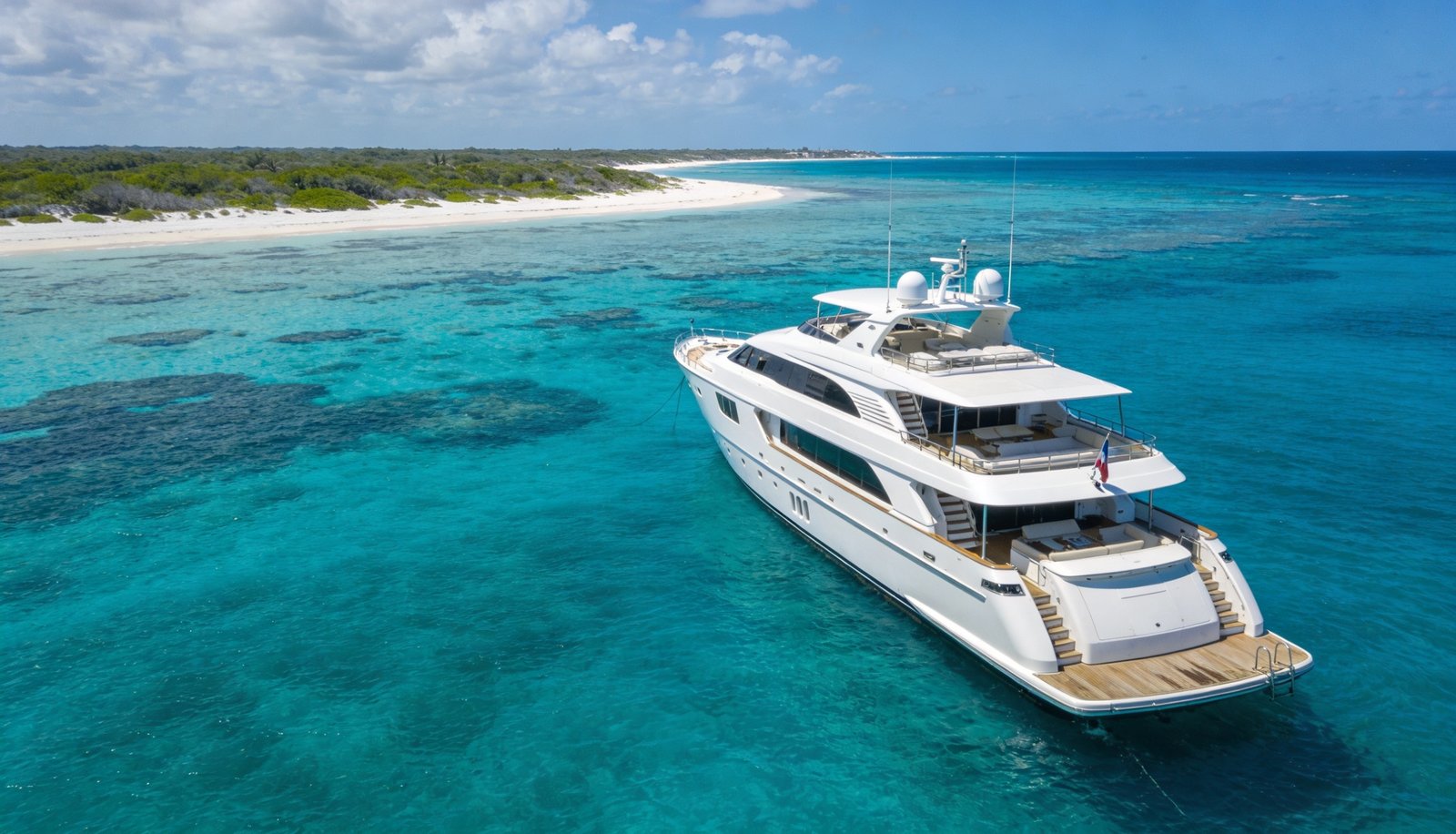 Playa del Carmen yacht rental: luxury yacht on turquoise Caribbean water
